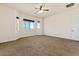 Bedroom with carpeted floor and window seat at 1623 E Hidalgo St, Apache Junction, AZ 85119