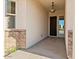 Light and bright entryway with modern dark wood door at 1623 E Hidalgo St, Apache Junction, AZ 85119