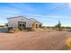 Single-story home with stone accents and desert landscaping at 1623 E Hidalgo St, Apache Junction, AZ 85119