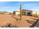 Single-story home with stone accents and desert landscaping at 1623 E Hidalgo St, Apache Junction, AZ 85119