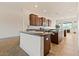 Modern kitchen with granite countertops and wood cabinets at 1623 E Hidalgo St, Apache Junction, AZ 85119