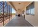 Spacious covered patio with ceiling fan and latticework at 1623 E Hidalgo St, Apache Junction, AZ 85119