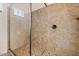 Large tiled walk-in shower with glass enclosure at 1623 E Hidalgo St, Apache Junction, AZ 85119