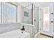 Bathroom with a shower, bathtub, and modern vanity at 17124 N Melissa Ln, Surprise, AZ 85374