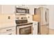 Stainless steel appliances in a well-lit kitchen at 17124 N Melissa Ln, Surprise, AZ 85374