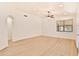 Living room with wood-look flooring and ceiling fan at 17124 N Melissa Ln, Surprise, AZ 85374