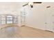 Bright living room with vaulted ceilings and light wood flooring at 17124 N Melissa Ln, Surprise, AZ 85374