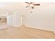 Open living area with wood-look floors and high ceilings at 17124 N Melissa Ln, Surprise, AZ 85374
