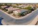 Aerial view of house with solar panels and landscaped yard at 1806 E Azafran Trl, Queen Creek, AZ 85140