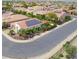 Aerial view of a house with solar panels and landscaping at 1806 E Azafran Trl, Queen Creek, AZ 85140