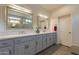 Double vanity bathroom with updated countertops and cabinets at 1806 E Azafran Trl, Queen Creek, AZ 85140