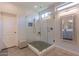 Bathroom with a walk-in shower and stylish finishes at 1806 E Azafran Trl, Queen Creek, AZ 85140