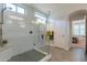 Modern bathroom with a large walk-in shower and updated fixtures at 1806 E Azafran Trl, Queen Creek, AZ 85140
