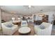 The open-concept living area includes hardwood floors, recessed lighting, and an airy feel at 1806 E Azafran Trl, Queen Creek, AZ 85140