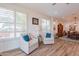 Bright living room with hardwood floors and comfortable seating at 1806 E Azafran Trl, Queen Creek, AZ 85140