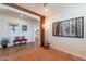 Sitting room includes a built-in Murphy bed and wood shelving at 1806 E Azafran Trl, Queen Creek, AZ 85140