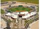 Aerial view of stadium with surrounding parking and landscaping at 18116 W Silverwood Dr, Goodyear, AZ 85338