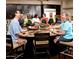 Residents enjoying a cooking class in a spacious kitchen at 18116 W Silverwood Dr, Goodyear, AZ 85338