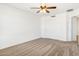 Well-lit bedroom featuring a double-door closet at 18437 W Sunnyslope Ln, Waddell, AZ 85355