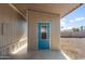 Rear view of home showing a blue exterior door at 205 S Higley Rd # 4, Mesa, AZ 85206