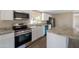 Updated kitchen featuring granite countertops and stainless steel appliances at 205 S Higley Rd # 4, Mesa, AZ 85206