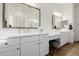 Double vanity bathroom with modern cabinets and large mirrors at 2258 E Athena Ave, Gilbert, AZ 85297