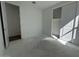 This bedroom features a walk-in closet and natural light at 22836 E Lords Way, Queen Creek, AZ 85142