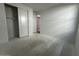 Bedroom featuring a closet, window, and freshly painted walls at 22836 E Lords Way, Queen Creek, AZ 85142