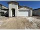 Stunning single-Gathering home featuring a 2-car garage and an arched entry at 22836 E Lords Way, Queen Creek, AZ 85142