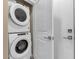 Stackable washer and dryer in a dedicated laundry room at 2286 E Hidalgo Ave, Phoenix, AZ 85040