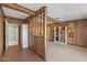 Finished basement area with wood paneling and built-in shelving at 232 E Colter St, Phoenix, AZ 85012