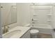 Clean bathroom featuring a shower and tub combination with a modern vanity at 2690 E Abe Truckle Ave, San Tan Valley, AZ 85140