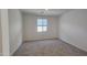 This cozy bedroom has new carpet, a window and natural light at 2690 E Abe Truckle Ave, San Tan Valley, AZ 85140
