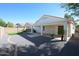 Spacious backyard with gravel landscaping and covered patio at 2732 W Lamar Rd, Phoenix, AZ 85017