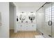 Elegant bathroom with double vanity, large mirror, and glass shower at 2732 W Lamar Rd, Phoenix, AZ 85017