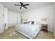 Spacious bedroom with light flooring and a comfy bed at 2732 W Lamar Rd, Phoenix, AZ 85017