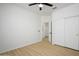 Simple bedroom with light wood floors and a large closet at 2732 W Lamar Rd, Phoenix, AZ 85017