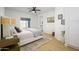 Bright bedroom with ensuite bathroom and a plush bed at 2732 W Lamar Rd, Phoenix, AZ 85017