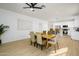 Dining area with wood table and chairs, open to the kitchen at 2732 W Lamar Rd, Phoenix, AZ 85017