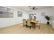Bright dining room with light wood floors and a modern dining set at 2732 W Lamar Rd, Phoenix, AZ 85017