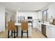 Modern kitchen with white cabinets, marble countertops, and stainless steel appliances at 2732 W Lamar Rd, Phoenix, AZ 85017