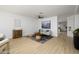 Light and airy living room featuring hardwood floors and a neutral color scheme at 2732 W Lamar Rd, Phoenix, AZ 85017