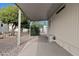 Spacious backyard with gravel landscaping and covered patio at 300 S Val Vista Dr # 152, Mesa, AZ 85204