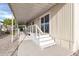 Home features a covered patio and ramp for accessibility at 300 S Val Vista Dr # 152, Mesa, AZ 85204