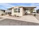 Mobile home exterior view with carport at 300 S Val Vista Dr # 152, Mesa, AZ 85204