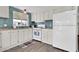 Updated kitchen features modern appliances and stylish tile backsplash at 300 S Val Vista Dr # 152, Mesa, AZ 85204