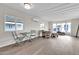 Living room with hardwood floors and seating area at 300 S Val Vista Dr # 152, Mesa, AZ 85204