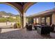 Relaxing covered patio with fire pit and comfortable seating at 35602 N Screaming Eagle Pass, Cave Creek, AZ 85331