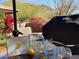 Relaxing patio with seating area and grill at 35602 N Screaming Eagle Pass, Cave Creek, AZ 85331