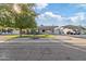 Ranch-style home with a carport and well maintained lawn at 3727 W Orangewood Ave, Phoenix, AZ 85051
